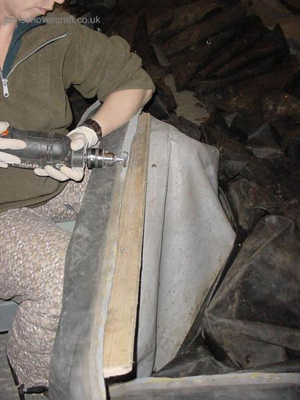 Restoring an old Tiger 12 hovercraft to a fully working state - Glueing on the skirt (credit: ).